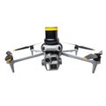 avss drone parachute on dji matrice 4 against white background