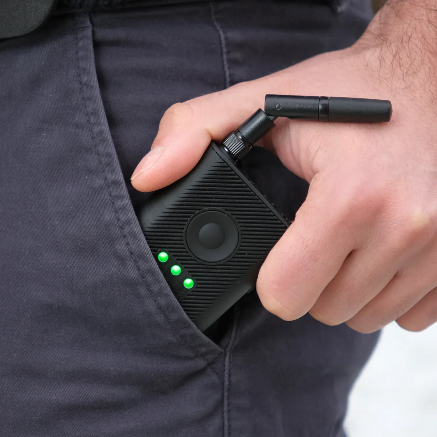 drone tag rider in pant pocket