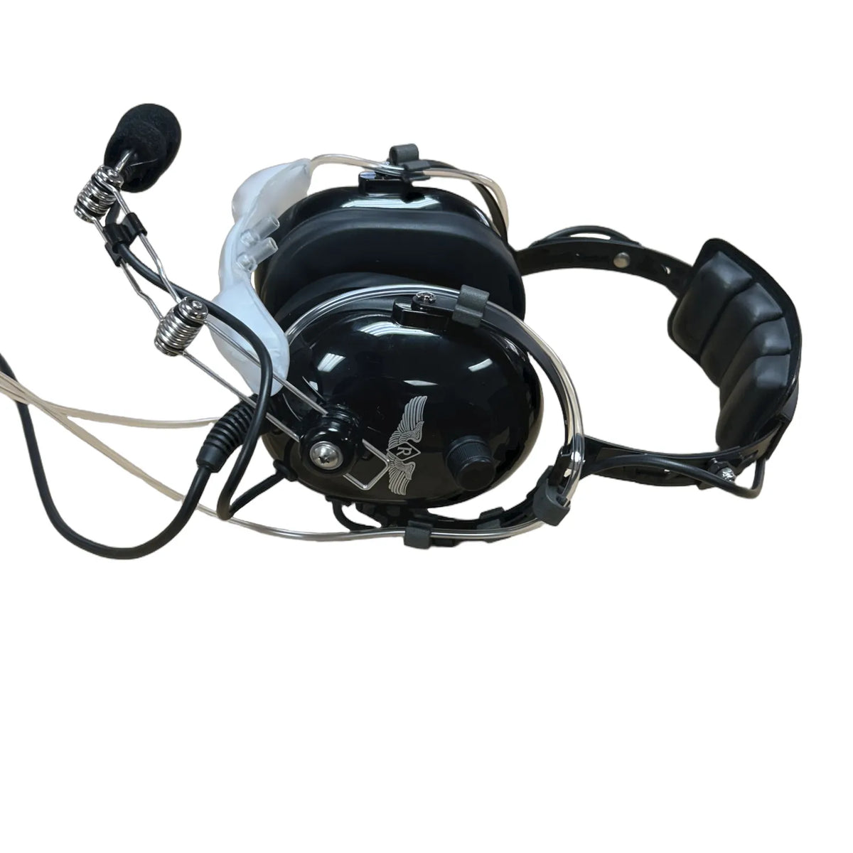 side view of pilot headset against white background with oxygen clips and cannula